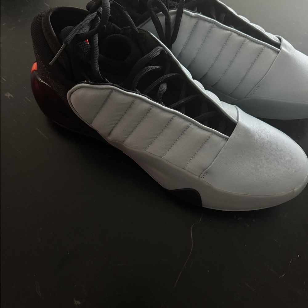 Black and Blue Athletic Shoes with Streamlined Design